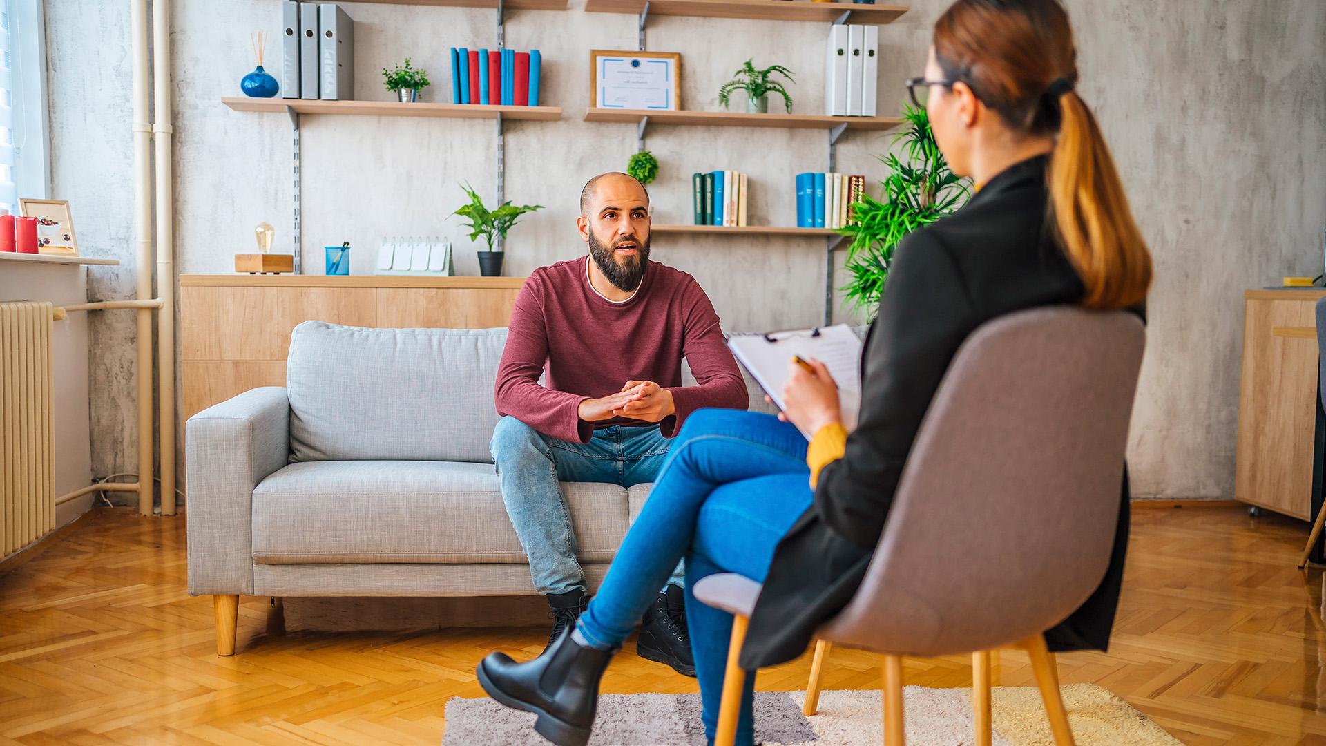 Clinical Psychology Doctor with patient on couch